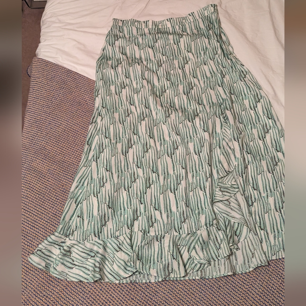 white maxi skirt with black and teal print